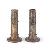 A large pair of Qajar openwork tinned-copper torchstands Persia, 19th Century(2)