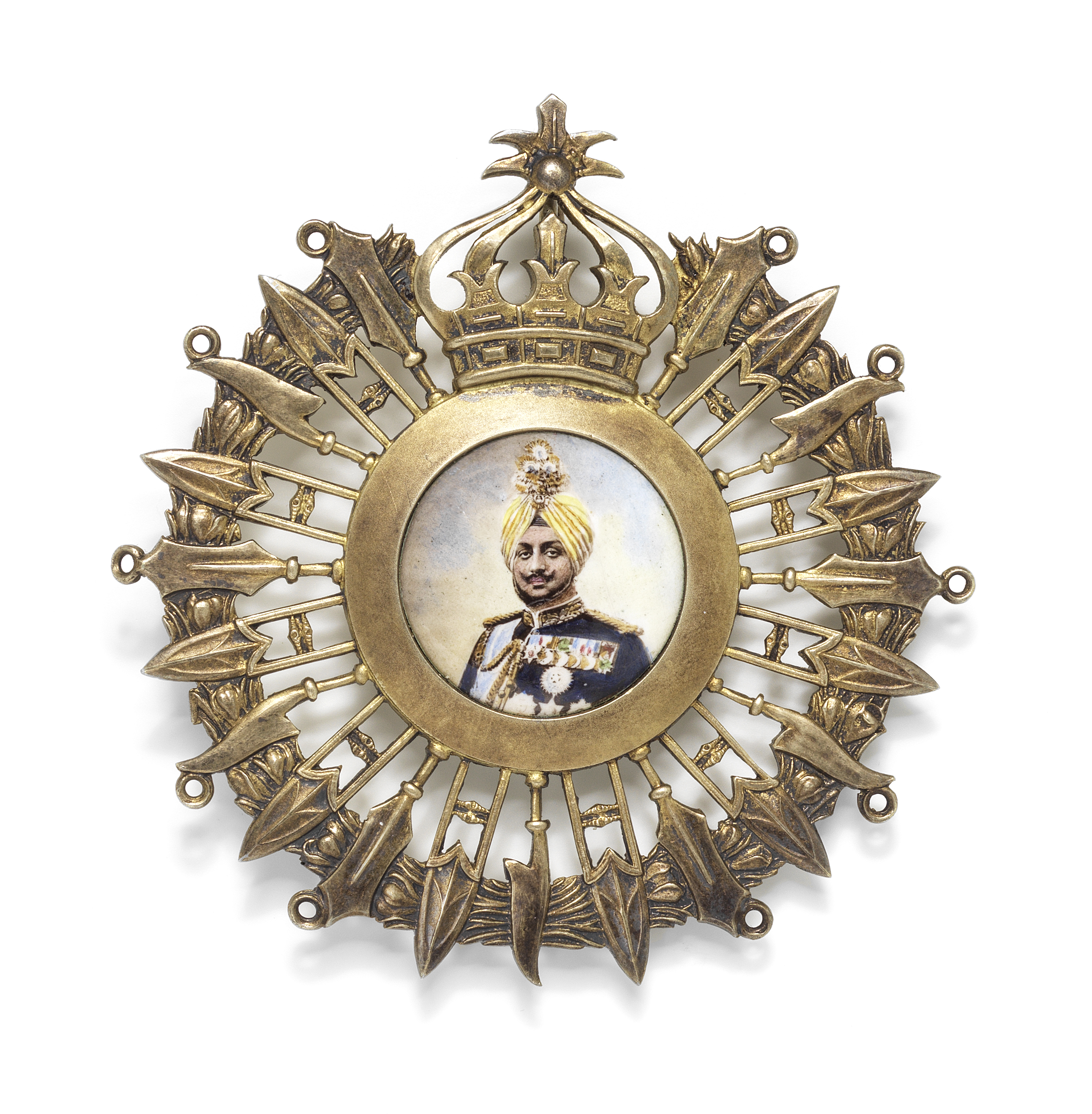 An enamelled gilt-silver portrait turban ornament (kalgi) depicting Maharajah Bhupinder Singh of...