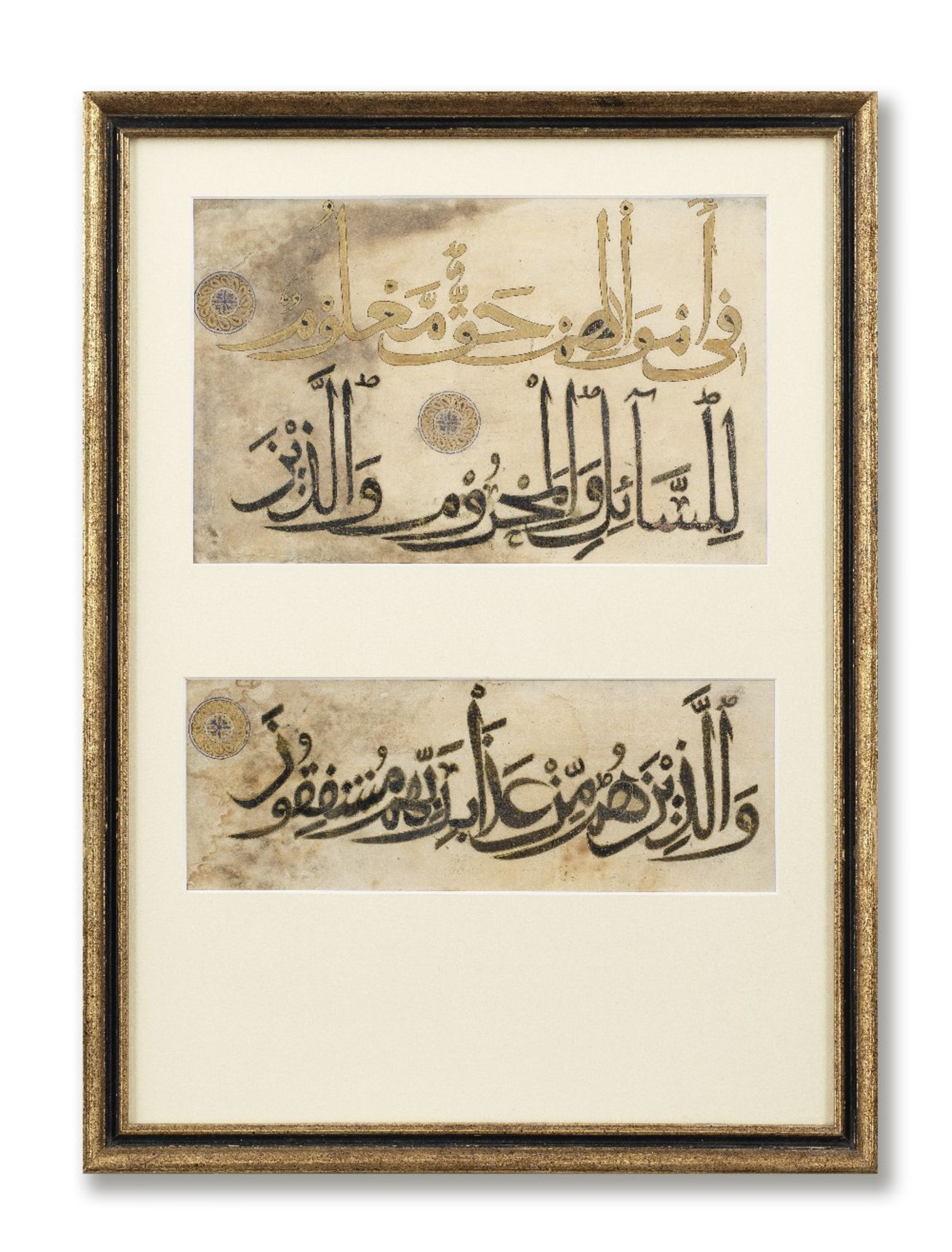 Three lines in muhaqqaq script from a large Ilkhanid manuscript of the Qur'an Iraq, early 14th C...