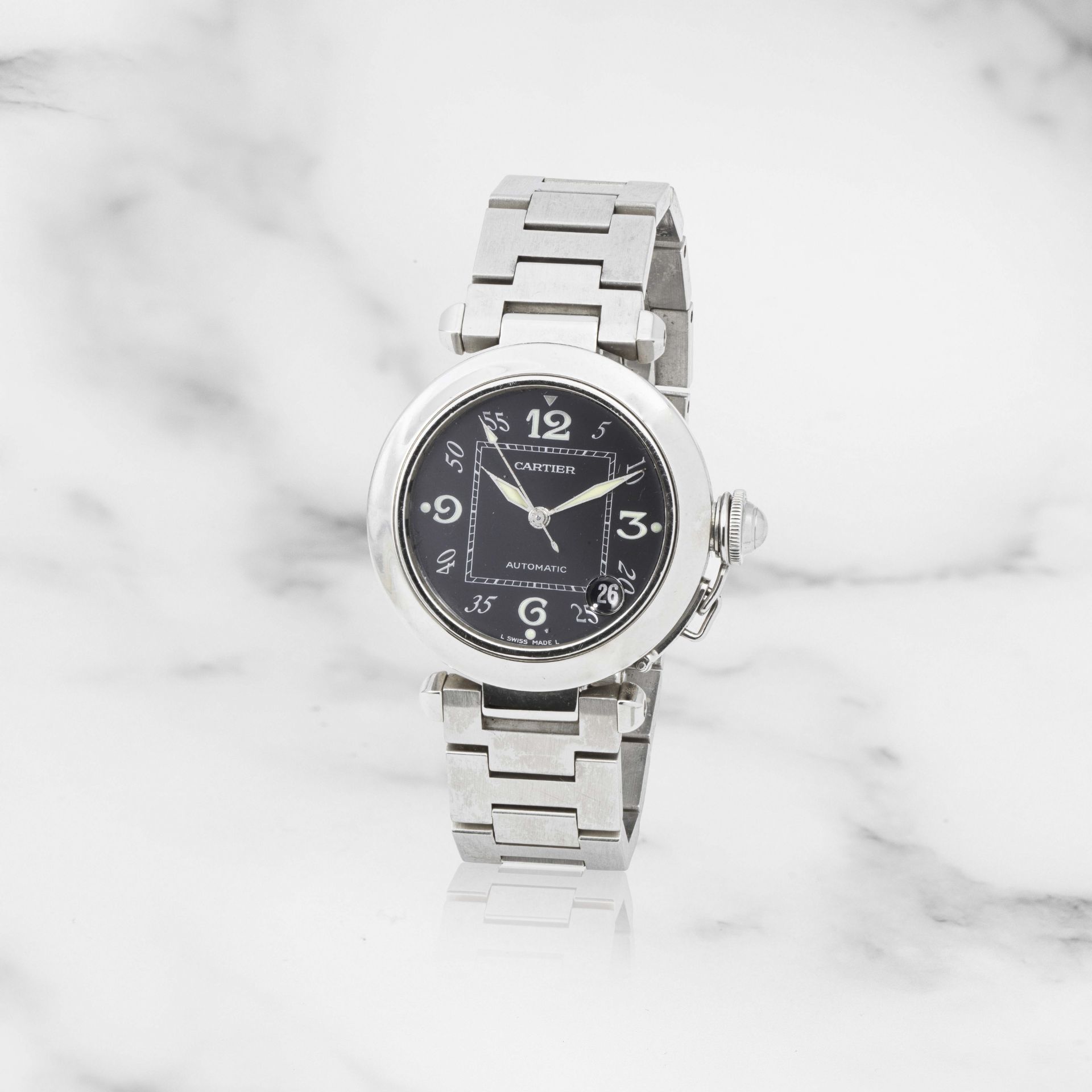 Cartier. Montre bracelet en acier avec date mouvement automatique Cartier. A stainless steel aut...