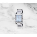 Baume & Mercier. Montre bracelet de dame en acier sertie de diamants mouvement quartz Baume & Me...