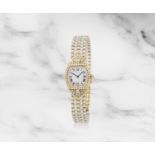 Cartier. Rare et belle montre de dame en or jaune 18K (750) sertie de diamants et bracelet en pe...