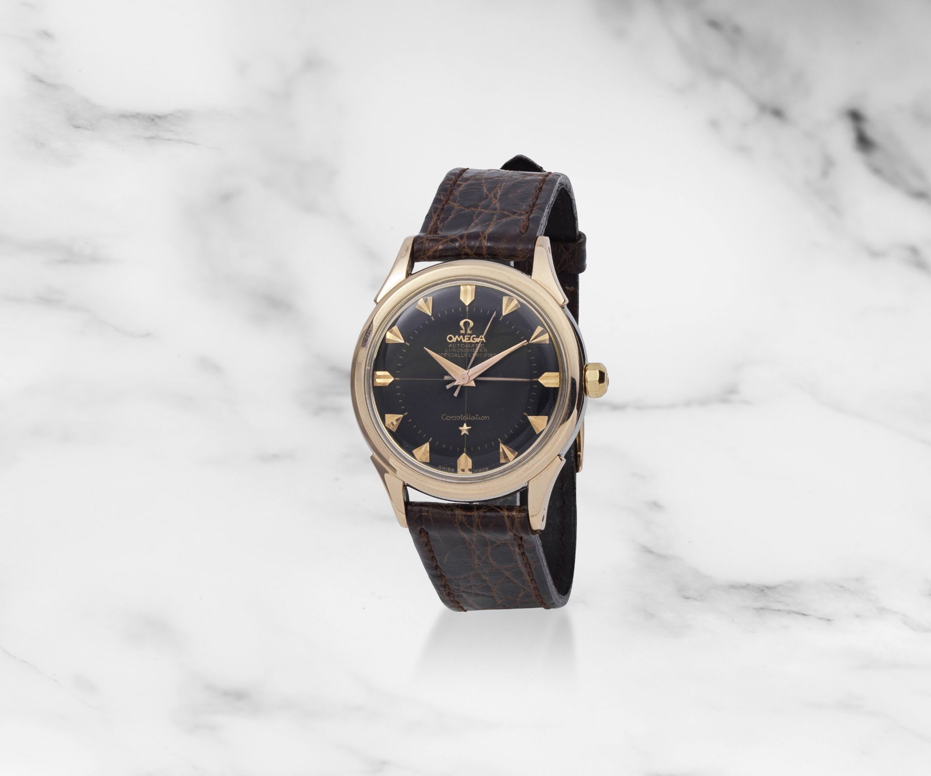 Omega. Montre bracelet plaqu&#233; or jaune et acier mouvement automatique Omega. A gold plated ...