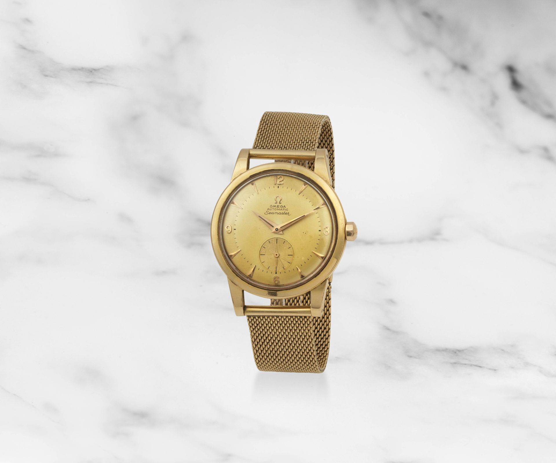 Omega. Montre bracelet en or jaune 18K (750) mouvement automatique &#224; bumper Omega. An 18K g...