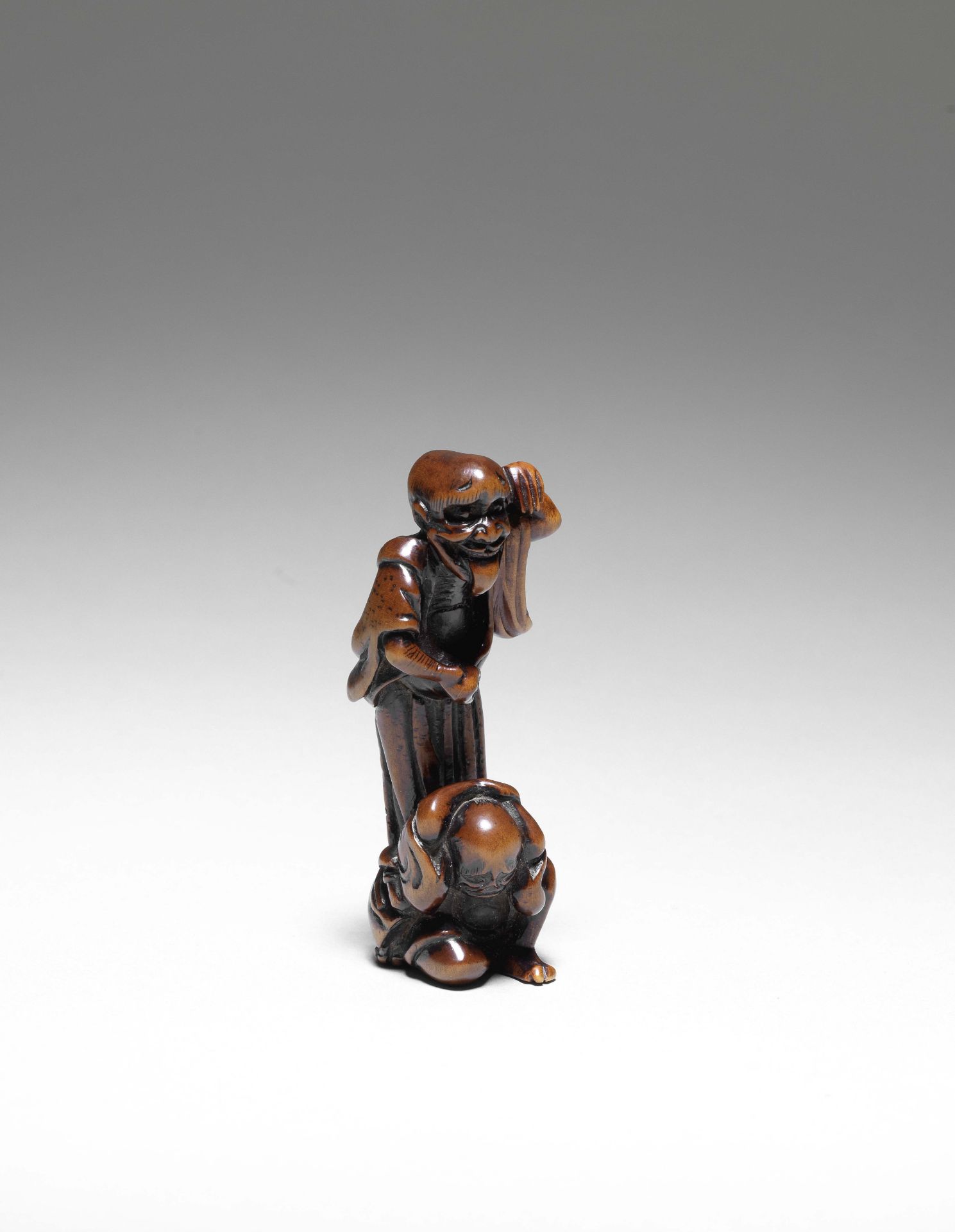 NETSUKE EN BOIS REPR&#201;SENTANT UN MIKOSHI-NYUDO TERRIFIANT UN VOYAGEUR Par Unjudoin Shidemaru...