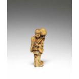 NETSUKE EN BOIS REPR&#201;SENTANT OKAME Par Sansho, fin du XIXe si&#232;cle