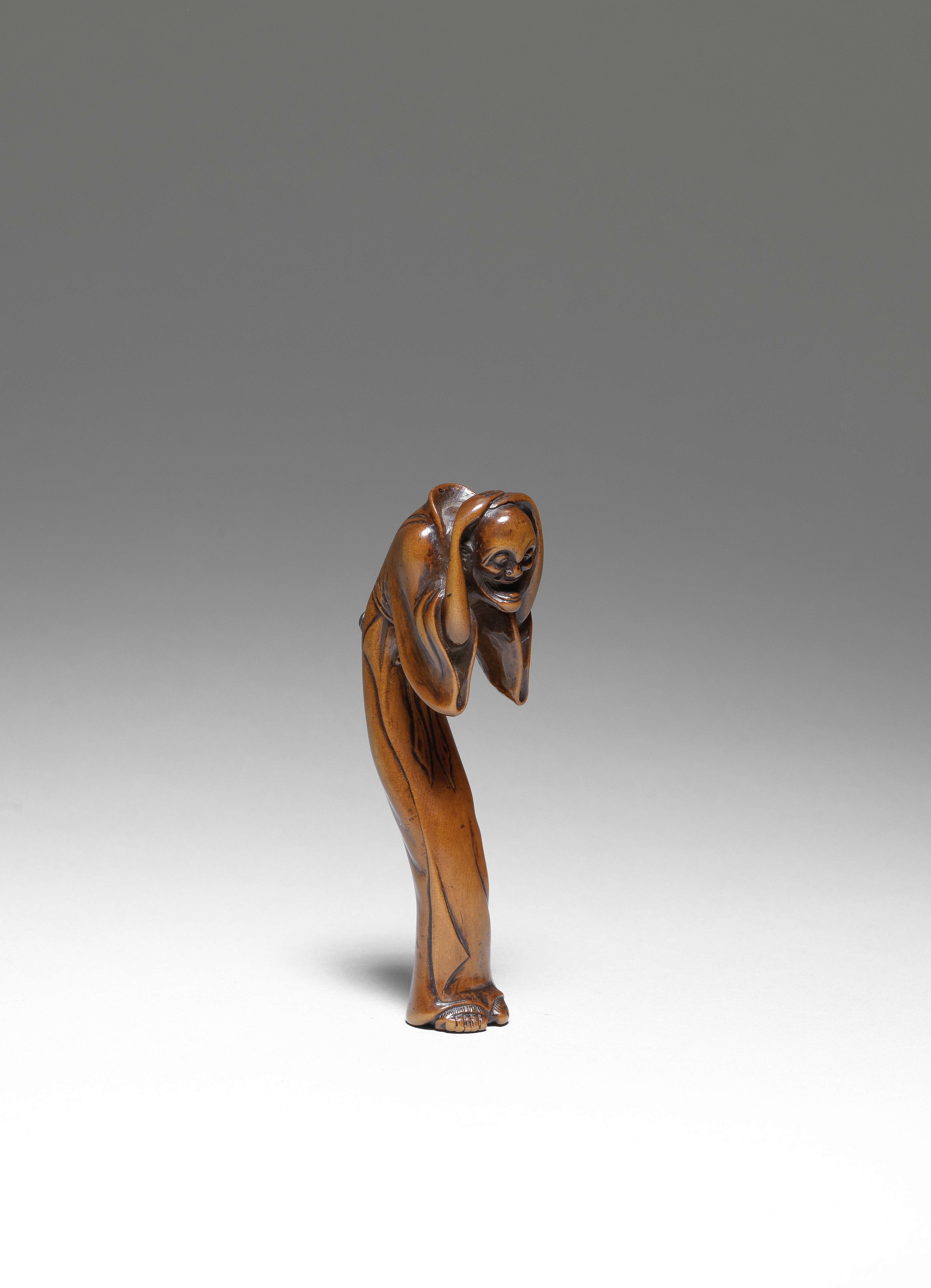 NETSUKE EN BOIS REPR&#201;SENTANT UN BAKEMONO XVIIIe si&#232;cle