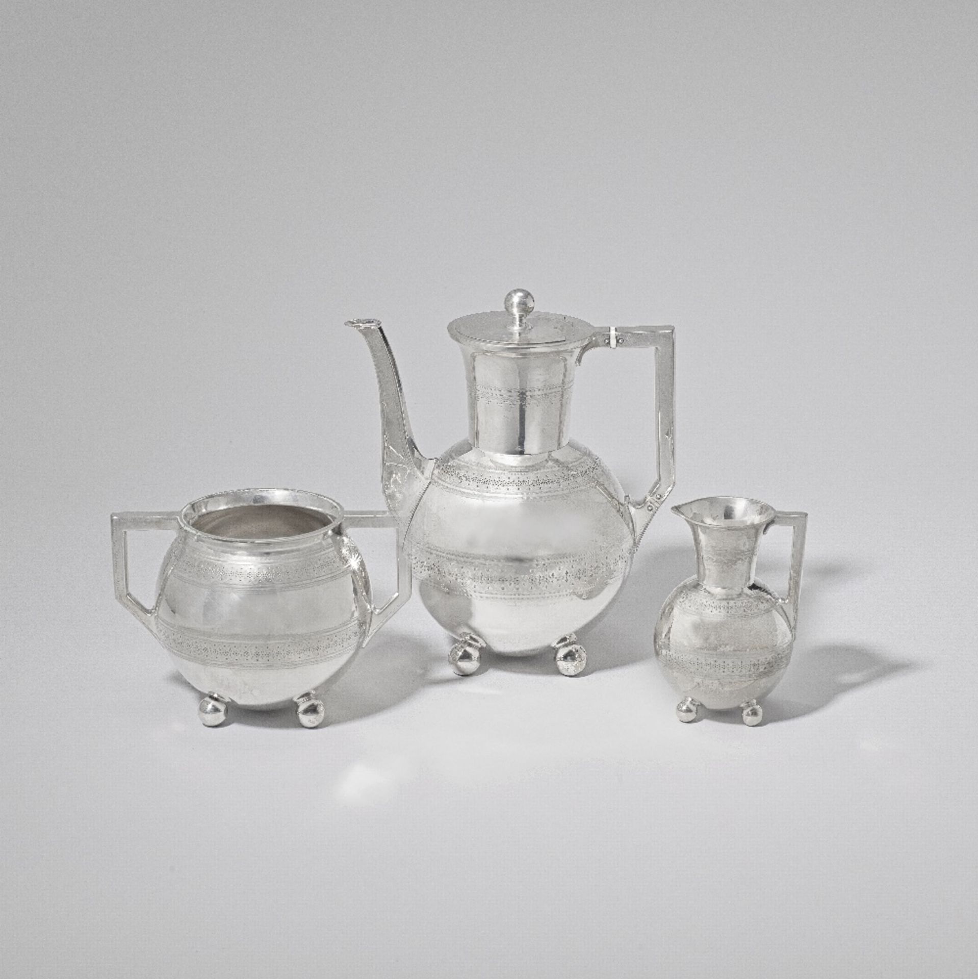 Attributed to Dr Christopher Dresser: Made by James Dixon & Sons Three-piece coffee set, model n...