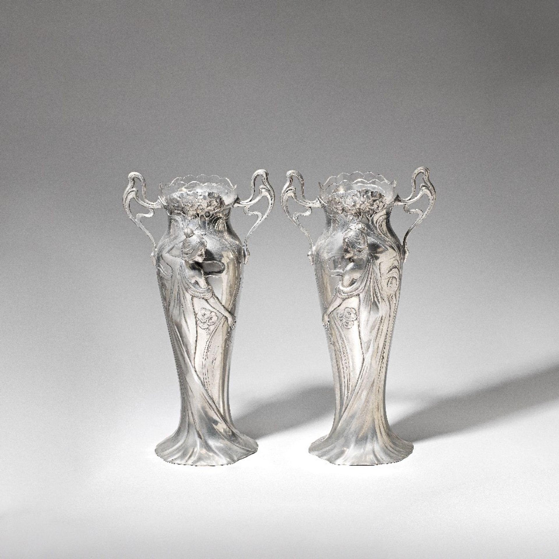 WMF (W&#252;rttembergische Metallwarenfabrik) Pair of flower vases, model nos.331a and 331b, cir...