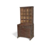 Attributed to Ernest Gimson or Peter Waals Glazed cabinet on chest, circa 1915