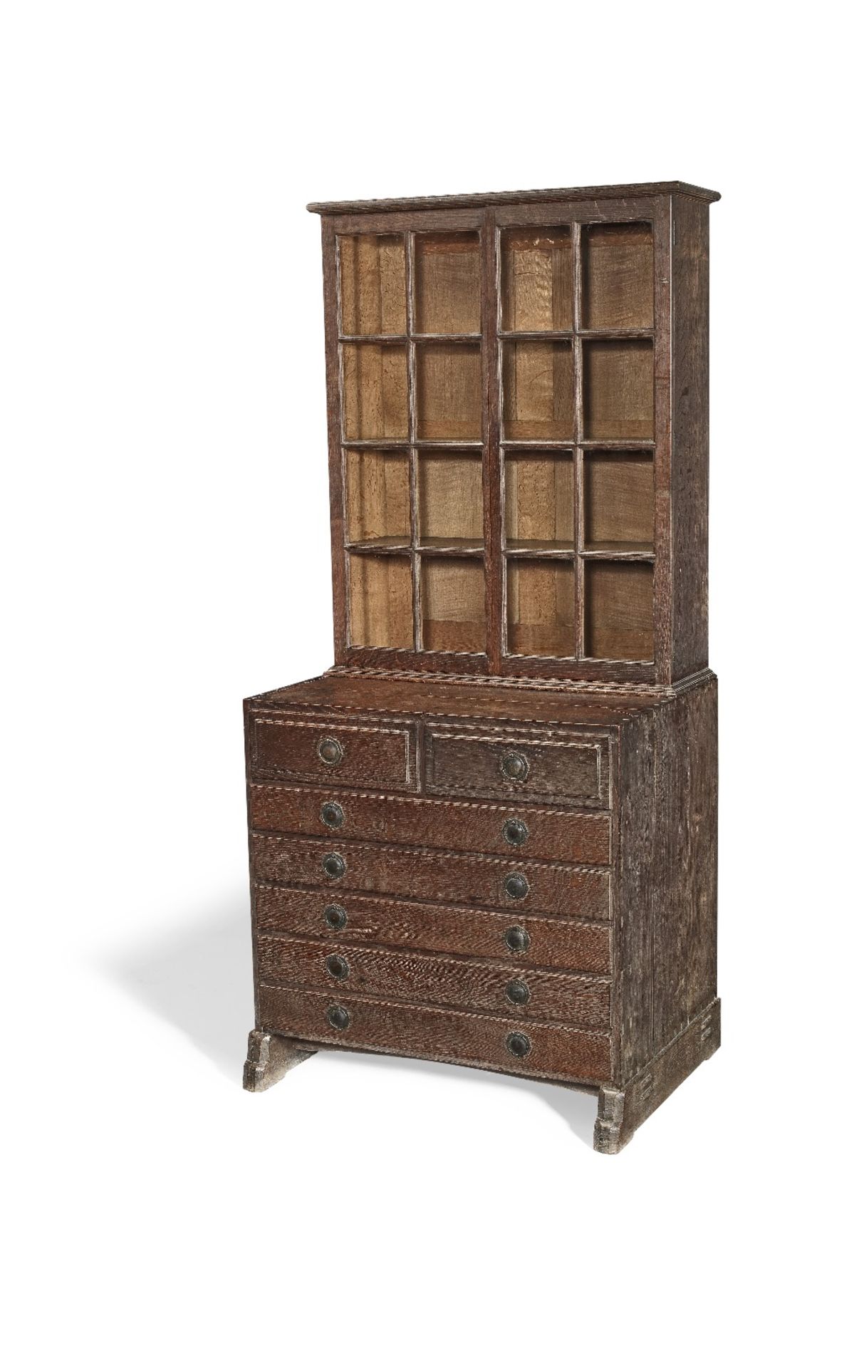 Attributed to Ernest Gimson or Peter Waals Glazed cabinet on chest, circa 1915