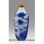 A violet-blue overlay semi-opaque white glass bottle Pine, lingzhi, rockwork, waves, clouds and ...