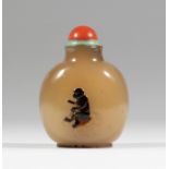 A large Suzhou chalcedony shadow agate snuff bottle 1770-1850 A horse to one side, a monkey to t...