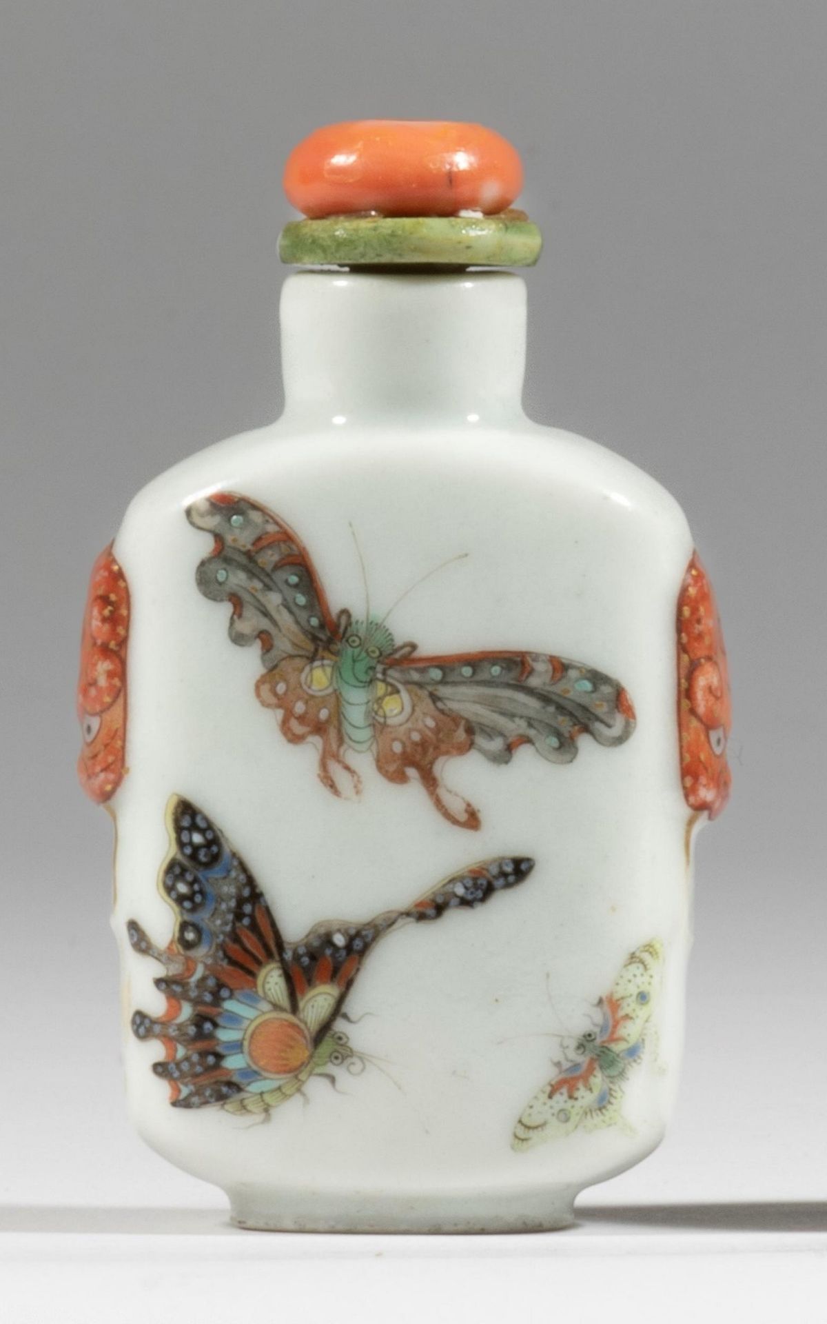 A fine enameled porcelain snuff bottle Daoguang seal mark and probably of the period Colorful bu...