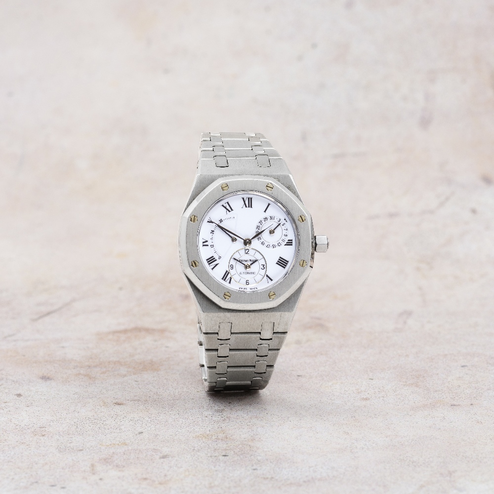 Audemars Piguet. A fine and rare stainless steel automatic calendar bracelet watch with power re...