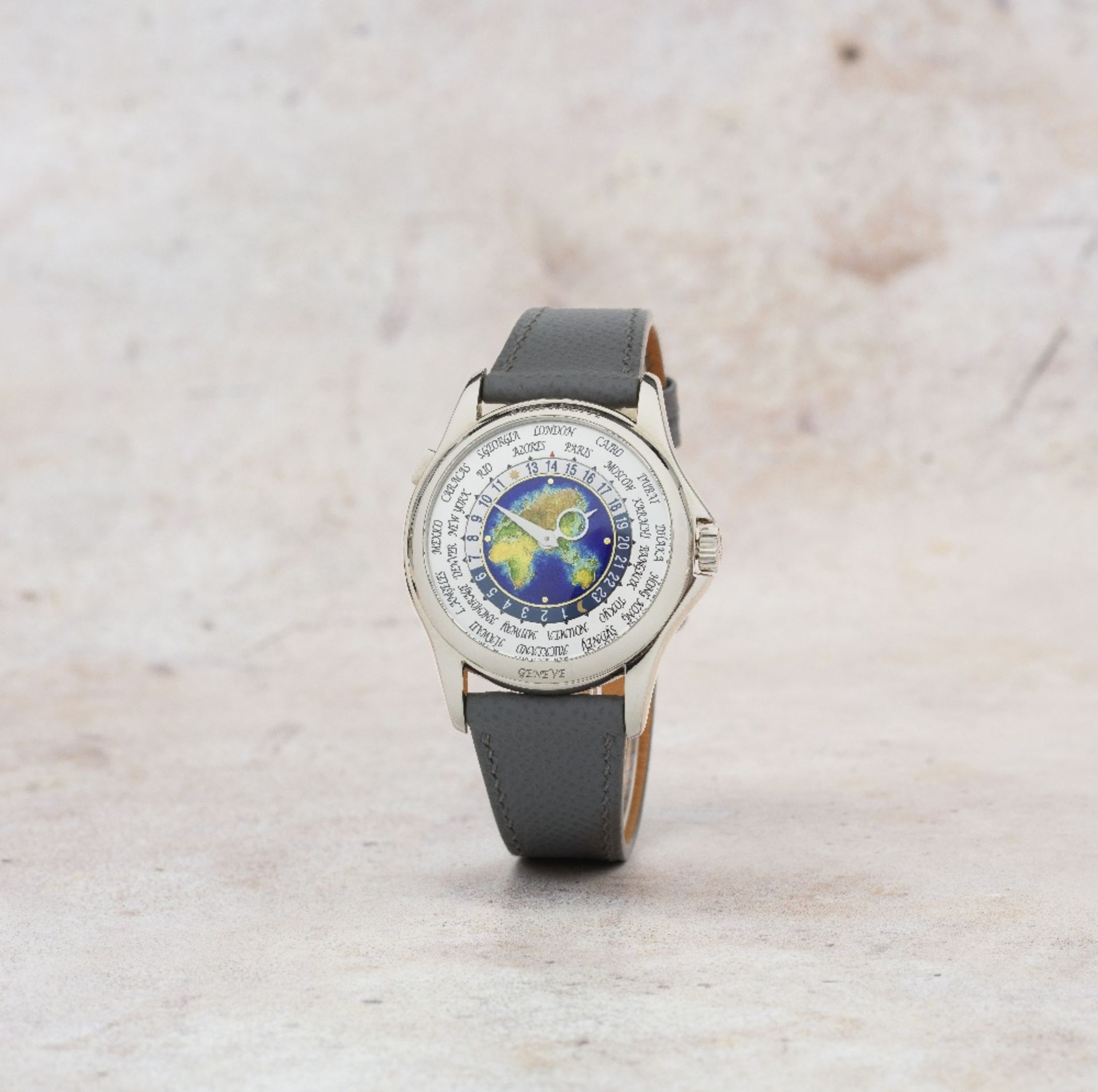 Patek Philippe. A fine 18K white gold automatic wristwatch with world time indication and polych...