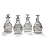 A set of four early 19th century cut-glass decanters (6)