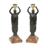 Attributed to Giuseppe Valadier (Italian, 1762-1839): A pair of patinated bronze figural candles...