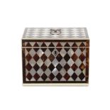 A rare Regency tortoiseshell and mother of pearl chequer inlaid and ivory strung tea caddy