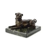 A late 18th/early 19th century patinated bronze model of a recumbent pug