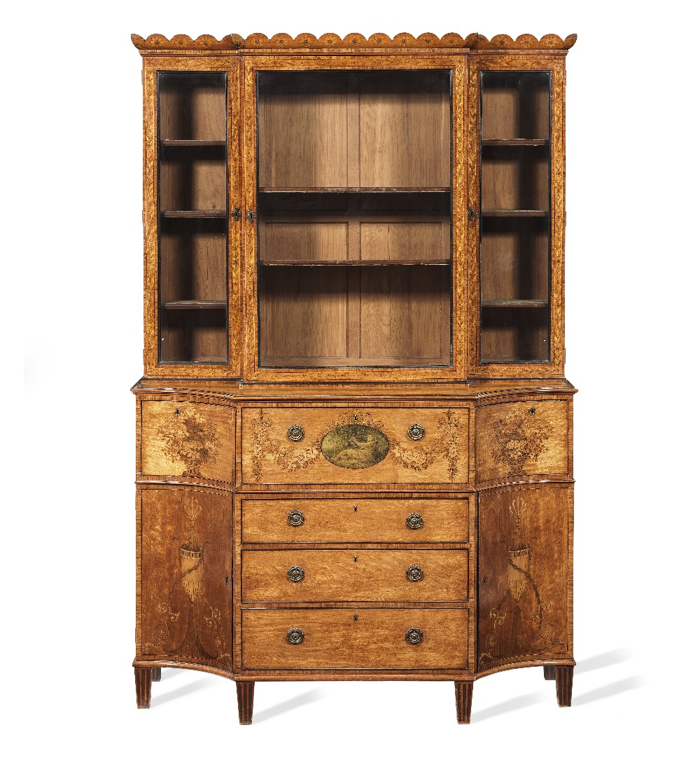 A George III satinwood, tulipwood crossbanded, purplewood and fruitwood marquetry breakfront sec...