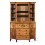 A George III satinwood, tulipwood crossbanded, purplewood and fruitwood marquetry breakfront sec...