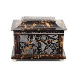 A good early Victorian tortoiseshell mother of pearl inlaid tea caddy