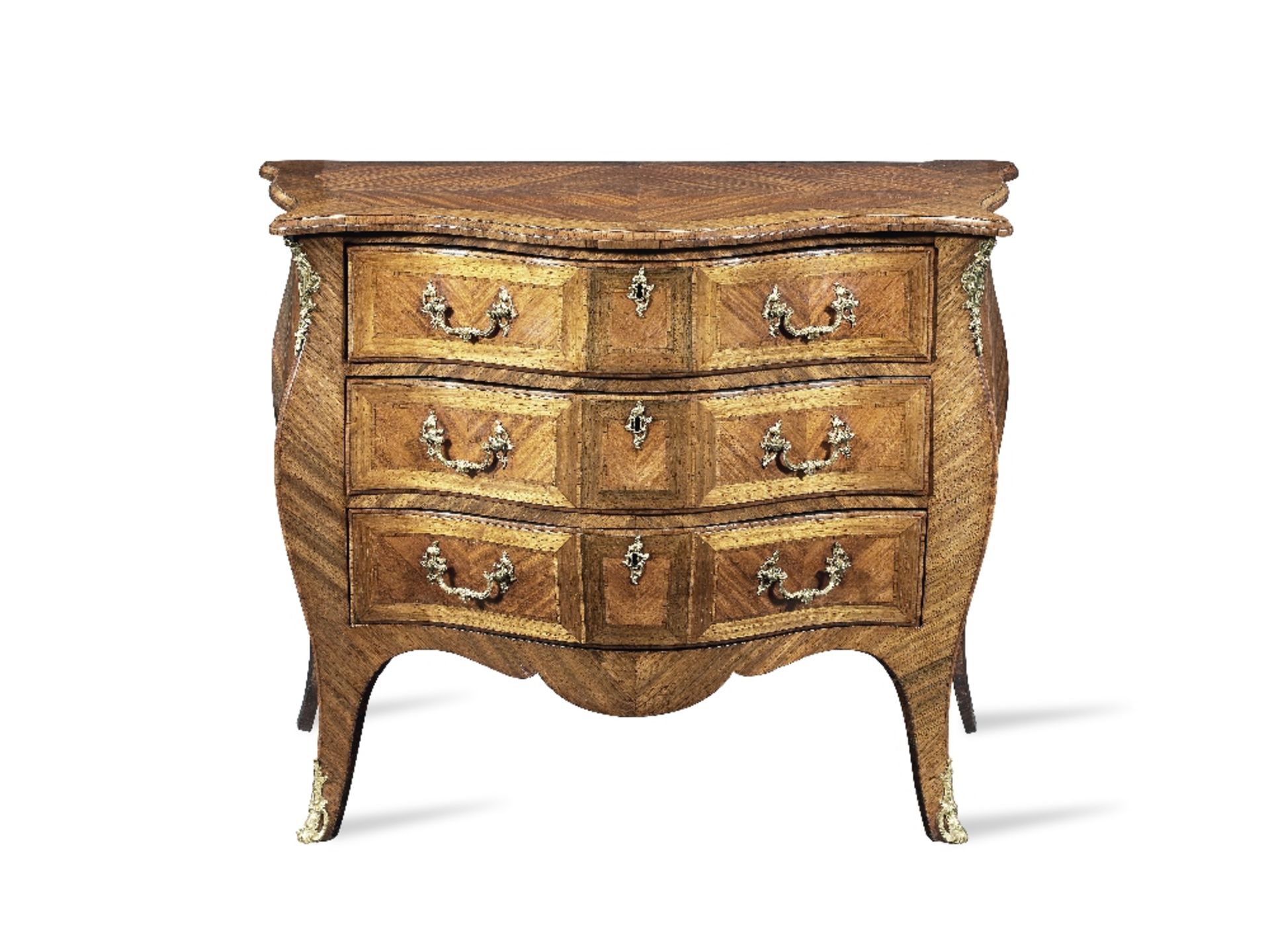 A George III ormolu mounted sabicu, rosewood and tulipwood serpentine commode attributed to Pier...