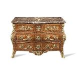 A Regence ormolu mounted kingwood, bois satine and amaranth bombe serpentine commode 1725-1730