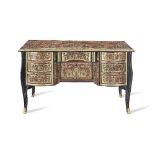 A French gilt bronze mounted tortoiseshell and brass Boulle marquetry ebonised kneehole desk or ...