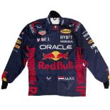 A signed replica Max Verstappen race suit,