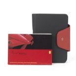 A Ferrari Enzo owner's manual in leather wallet, ((3))