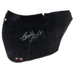 A 1965 AC Cobra leather door panel signed by Carroll Shelby, ((2))