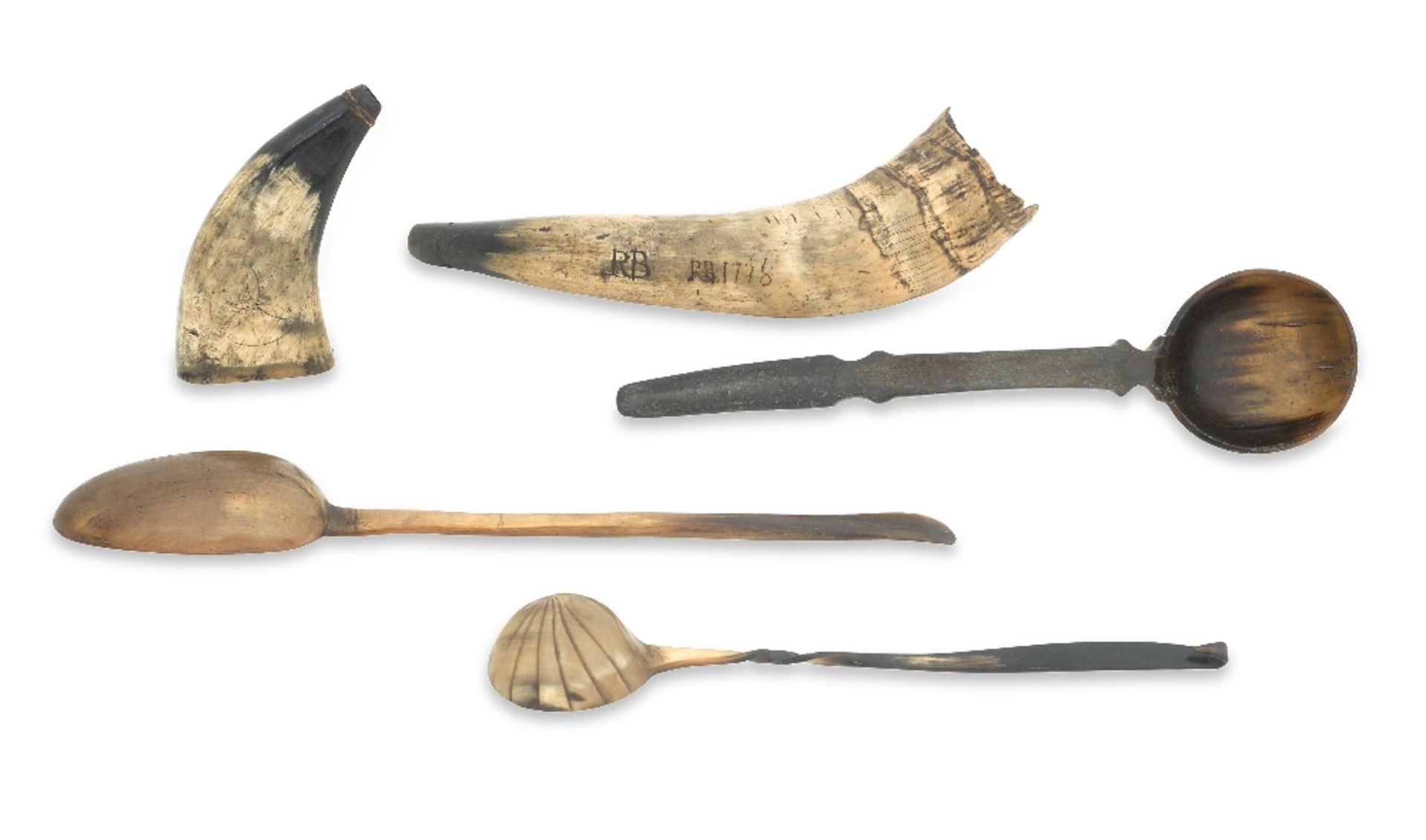 A collection of horn including a dated powder horn 18th/19th century (5)