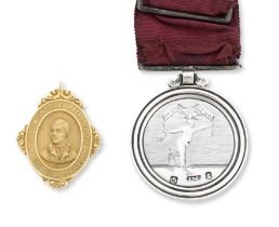 A silver Edinburgh Skating Club medal and a 15ct gold Glasgow Haggis Club medal