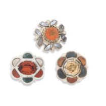 Three silver and gem-set hardstone brooches