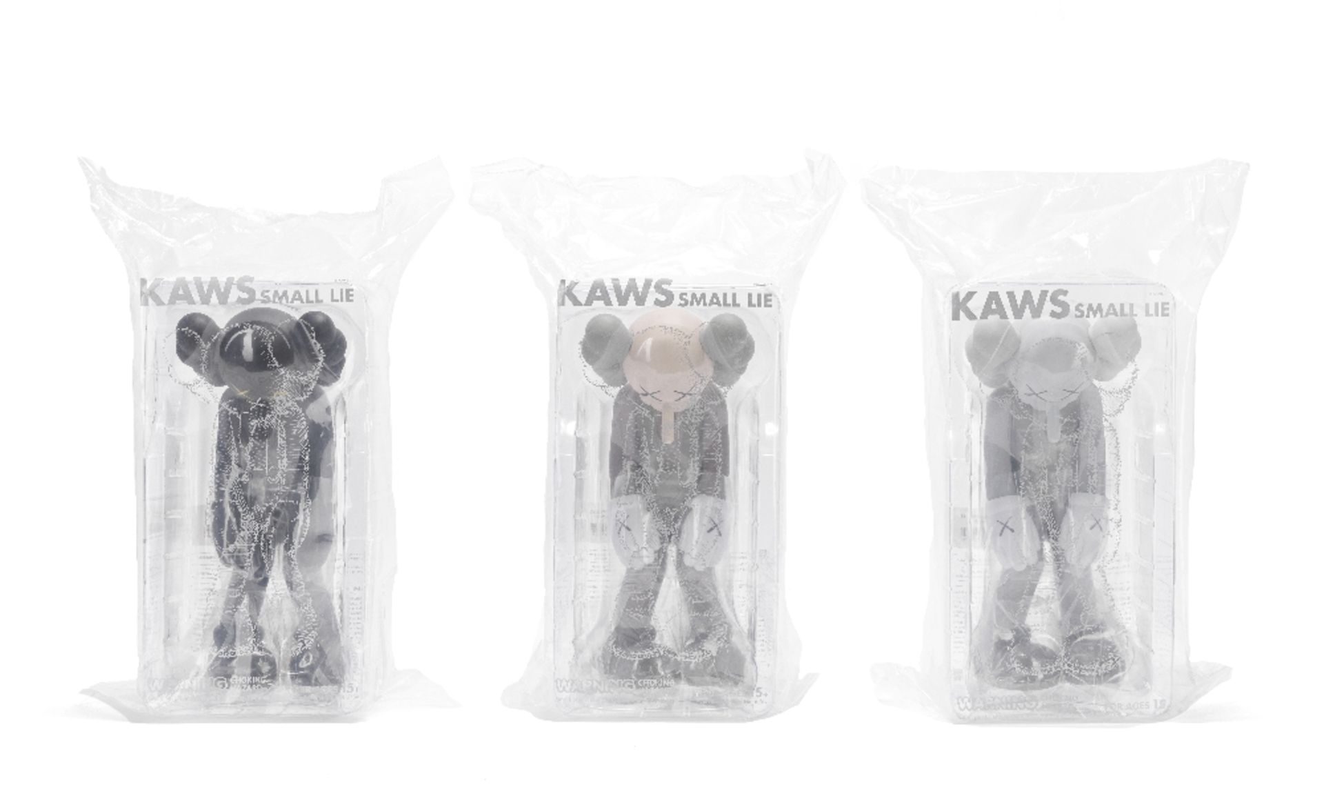 KAWS (American, born 1974) Small Lie The complete set of three painted cast vinyl multiples, 2017...