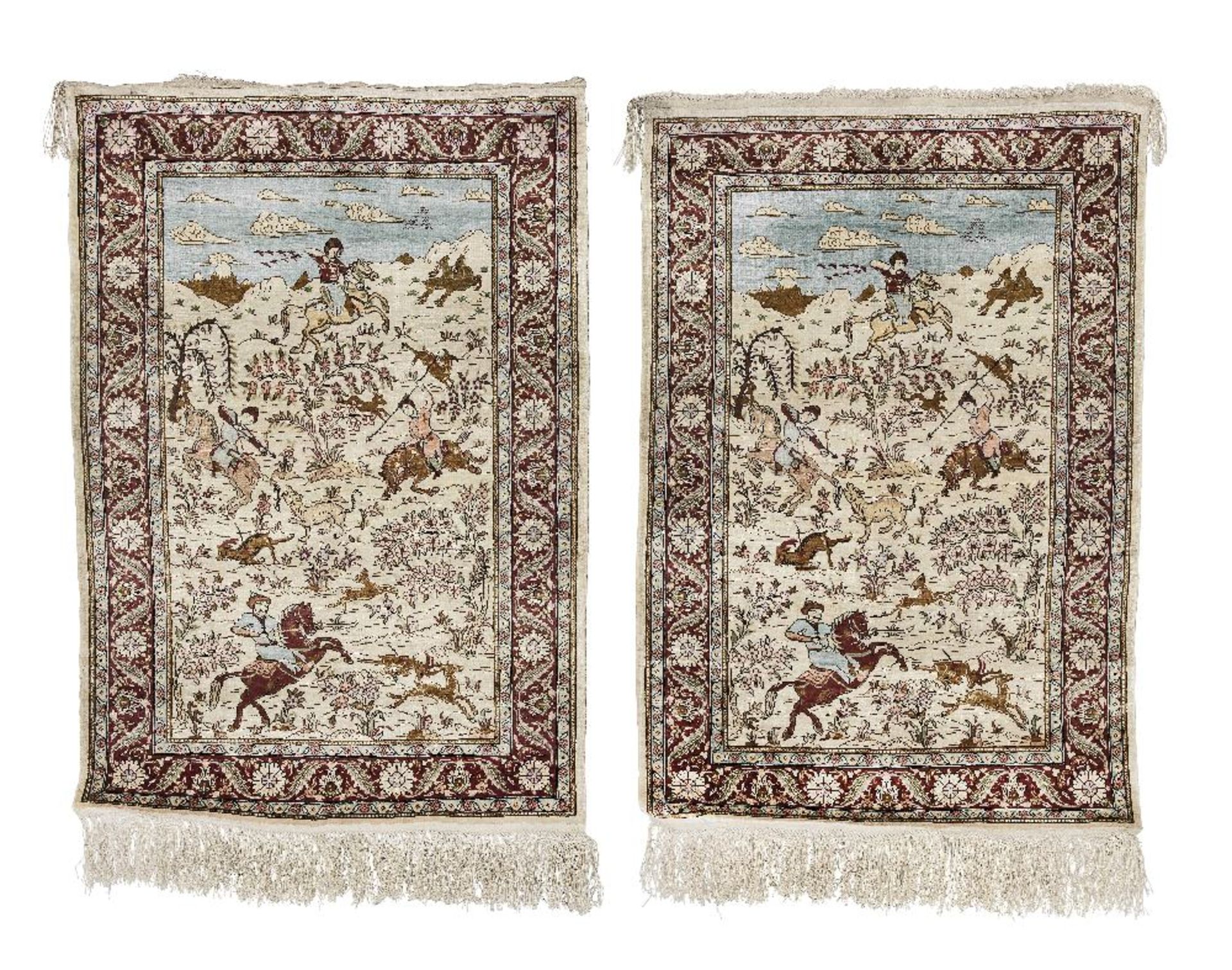 A pair of silk Qum carpets Central Persia, 91cm x 62cm