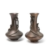 A pair of signed bronze Japanese vases probably late Meiji or Taisho period