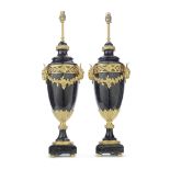 A pair of decorative gilt bronze and verde antico marble garniture urn lamp bases in the Louis X...