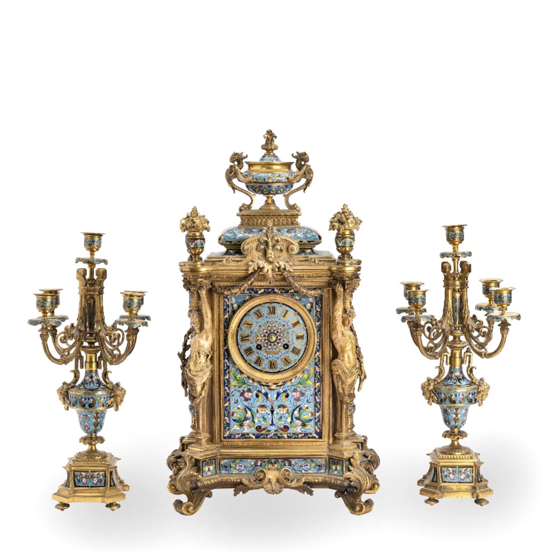 A good late 19th century French gilt bronze and champleve enamel clock garniture the movement wi...