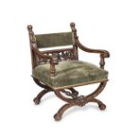 An Italian 19th century Renaissance revival carved walnut x-frame armchair