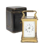 A late 19th century French carriage clock with travel case and numbered winding key signed and n...