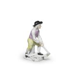 A mid 18th century Meissen porcelain figure of a woodcutter