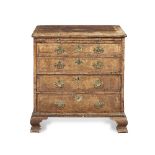 A George II walnut and featherbanded chest of small proportions Circa 1730