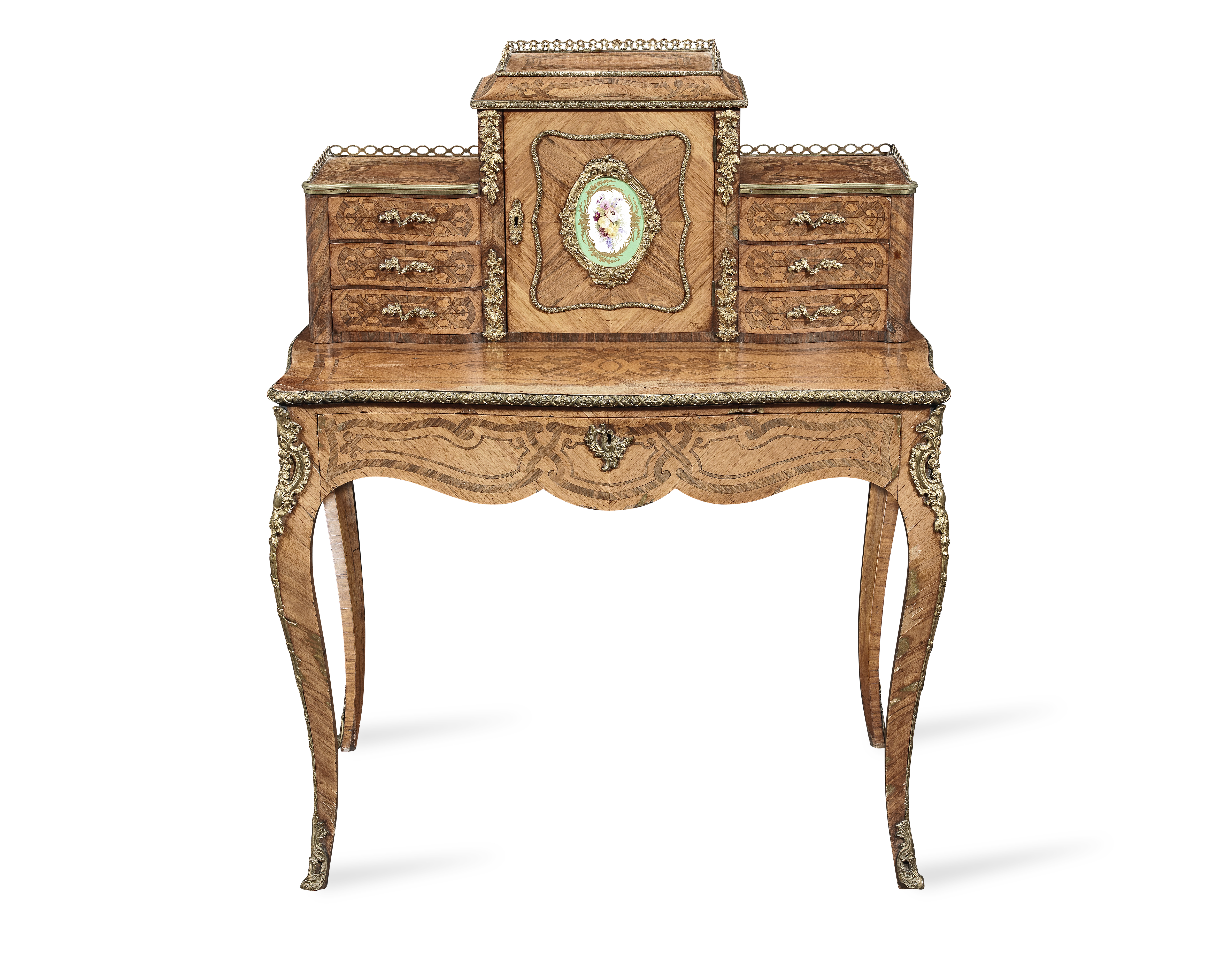 An early Victorian ormolu and porcelain mounted tulipwood and kingwood bonheur du jour in the Fr...