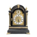 A late 19th century ebonised and gilt brass mounted chiming bracket clock in the George III style
