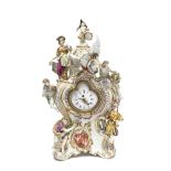 An impressive late 19th century Continental allegorical porcelain figural mantel timepiece with ...