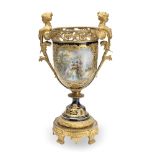 A late 19th Century gilt bronze mounted twin handled Sevres style vase in the Louis XVI style