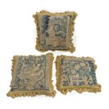 A set of three Flemish tapestry cushions 17th century, probably Oudenaarde, the largest 49cm x...